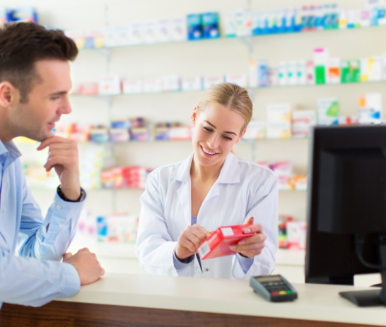 pharmacist discussing options with patient