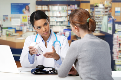 pharmacist advising patient